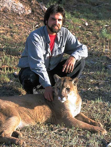 Artist Dan DAmico with one of his models, a cougar.