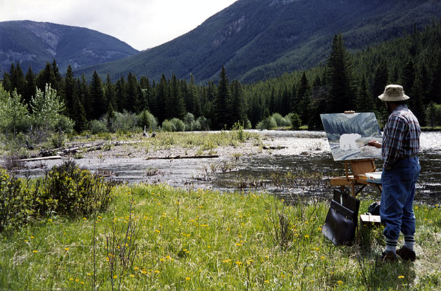 Artist Dan DAmico painting in the Beartooth Mountains, Montana.